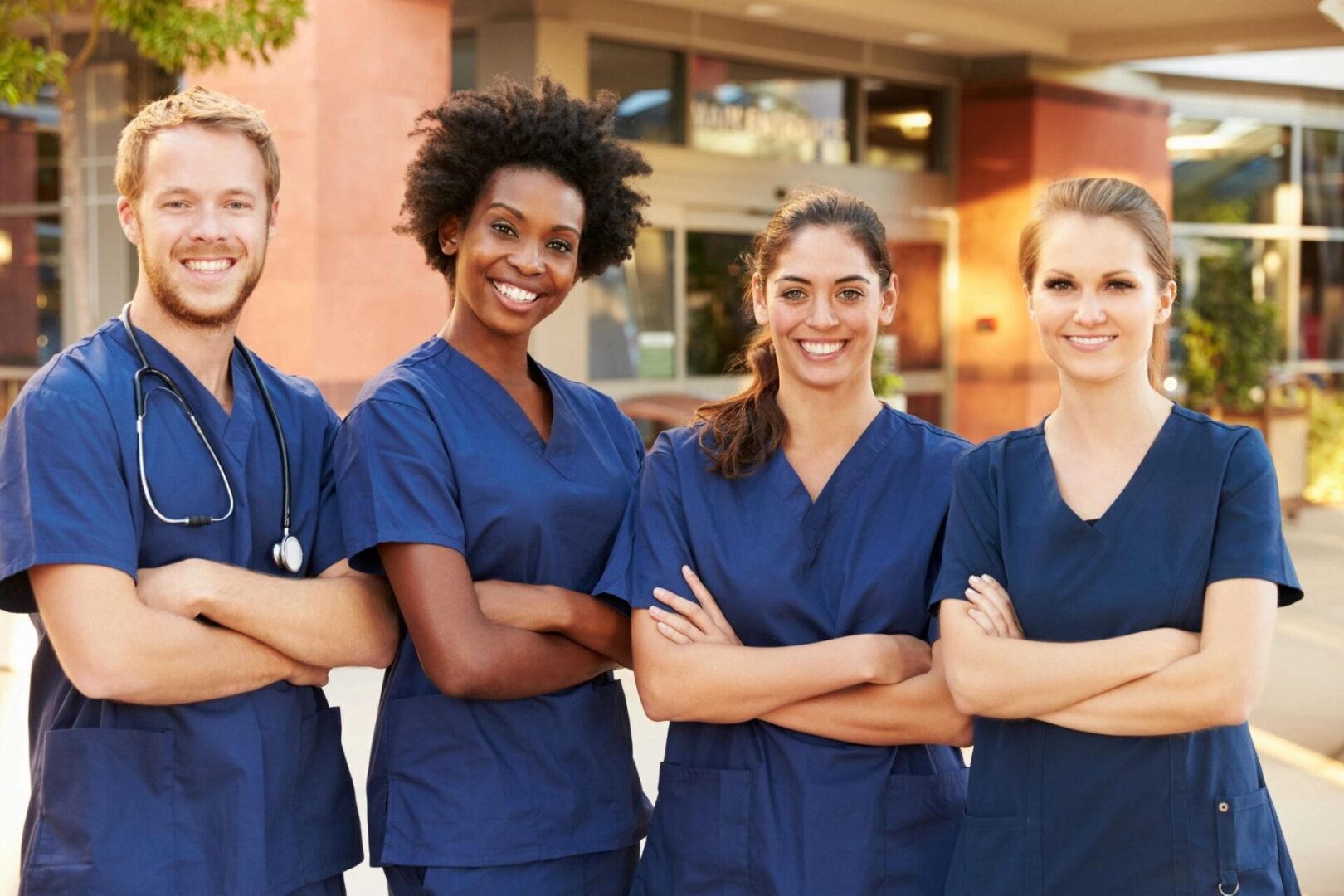fm=f_14354 A group of nurses standing next to each other.